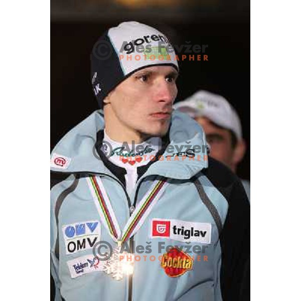 Robi Kranjec of Slovenia with bronze medal from Ski jumping team event at 2010 Oslo Nordic World Championships at official reception in front of Ljubljana Town Hall, Slovenia on March 8, 2011 
