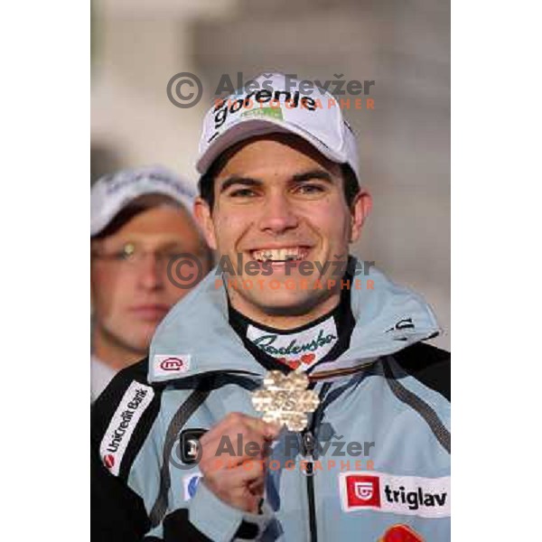 Jernej Damjan of Slovenia with bronze medal from Ski jumping team event at 2010 Oslo Nordic World Championships at official reception in front of Ljubljana Town Hall, Slovenia on March 8, 2011 