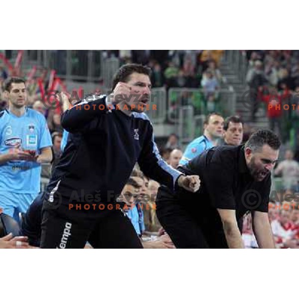 Primoz Trost, Boris Denic, head coach of Slovenia in action during handball match Slovenia-Poland in first leg of qualification for EHF Handball Euro 2012, played in front of 12.000 spectators in Stozice, Ljubljana, Slovenia on march 9, 2011 