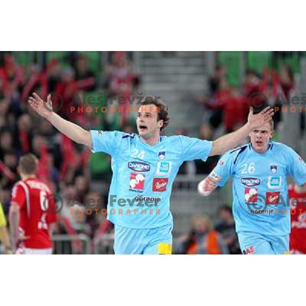  Uros Zorman of Slovenia in action during handball match Slovenia-Poland in first leg of qualification for EHF Handball Euro 2012, played in front of 12.000 spectators in Stozice, Ljubljana, Slovenia on march 9, 2011 