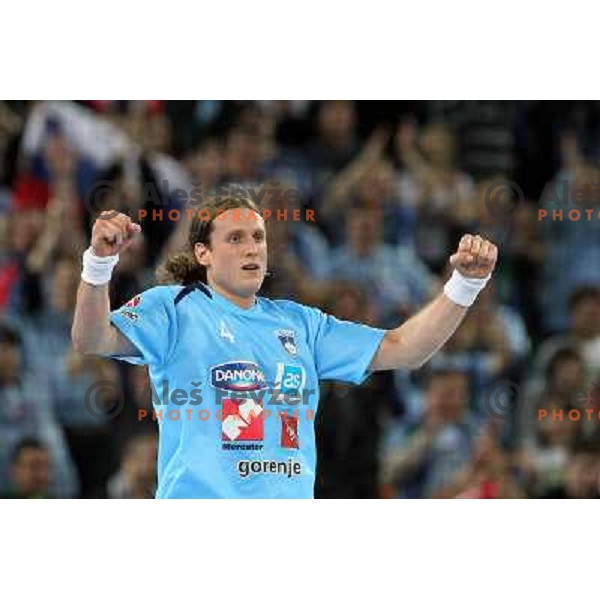 David Miklavcic of Slovenia in action during handball match Slovenia-Poland in first leg of qualification for EHF Handball Euro 2012, played in front of 12.000 spectators in Stozice, Ljubljana, Slovenia on march 9, 2011 