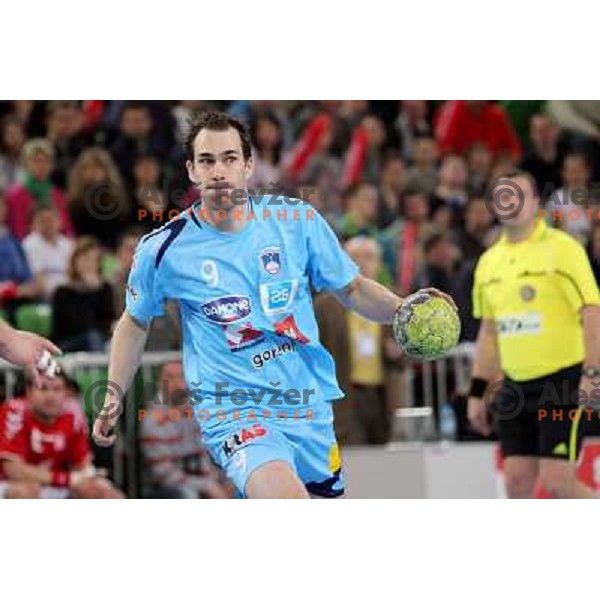 Jure Natek of Slovenia in action during handball match Slovenia-Poland in first leg of qualification for EHF Handball Euro 2012, played in front of 12.000 spectators in Stozice, Ljubljana, Slovenia on march 9, 2011 