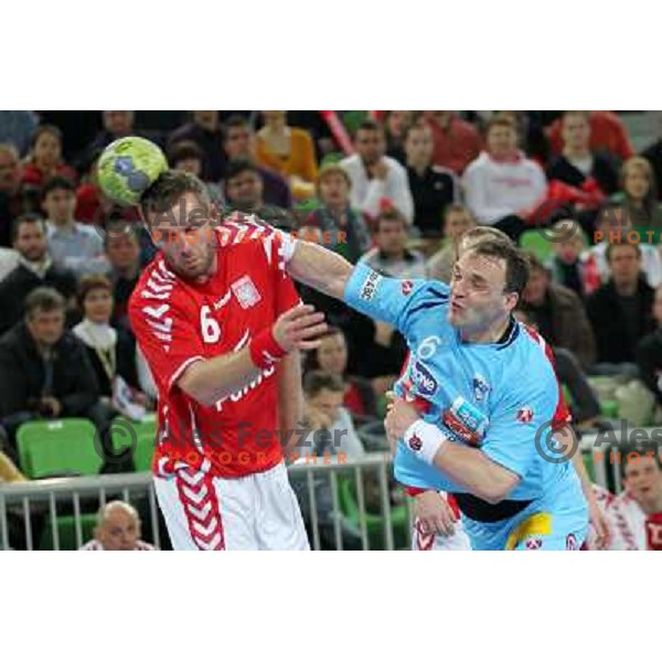Peter Pucelj of Slovenia in action during handball match Slovenia-Poland in first leg of qualification for EHF Handball Euro 2012, played in front of 12.000 spectators in Stozice, Ljubljana, Slovenia on march 9, 2011 