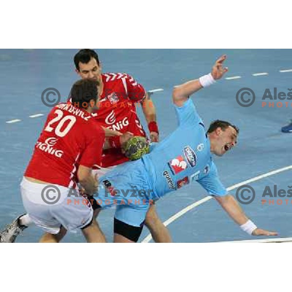 Peter Pucelj of Slovenia in action during handball match Slovenia-Poland in first leg of qualification for EHF Handball Euro 2012, played in front of 12.000 spectators in Stozice, Ljubljana, Slovenia on march 9, 2011 