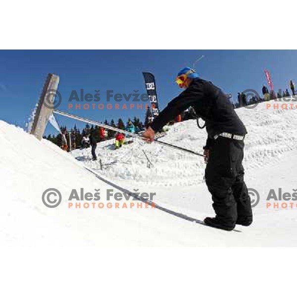 Shaper works during Snowboard FIS Europa Cup Big Air competition at Rogla Ski Resort, Slovenia on March 12, 2011 