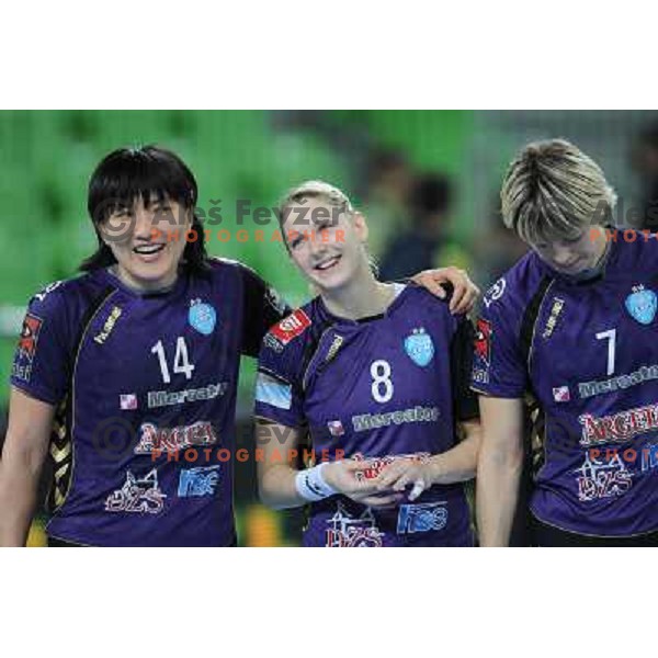 Ljudmila Bodnieva, Tamara Mavsar, Marina Vergelyuk in action at the handball game RK Krim Mercator Ljubljana - Oltchim Valcea, played in the Women\'s EHF Champions league main round, 19.03.2011 , Stozice Arena, Ljubljana, 