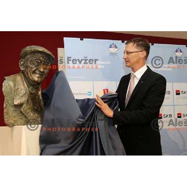 Igor Luksic admires Stanko Bloudek Statue which was presented to public after OKS General Assembly in hotel Union, Ljubljana, Slovenia on June 23, 2011 