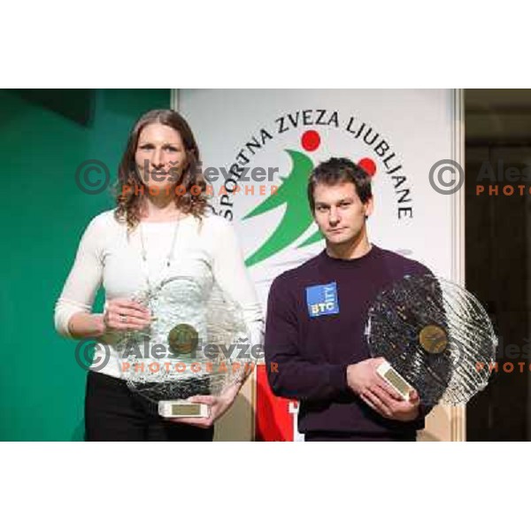 Nina Vehar and Mitja Petkovsek with trophies for best sportsman of city of Ljubljana in 2011 during gala event in Festival Hall, Ljubljana, Slovenia on December 14, 2011