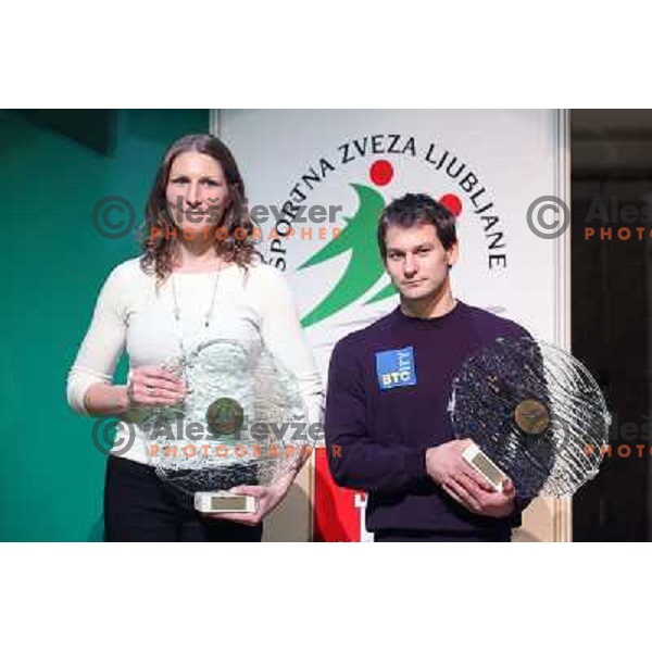Nina Vehar and Mitja Petkovsek took the prizes for first place during gala event "Sportsman of Ljubljana 2011" in Festival Hall, Ljubljana, slovenia on December 14, 2011 