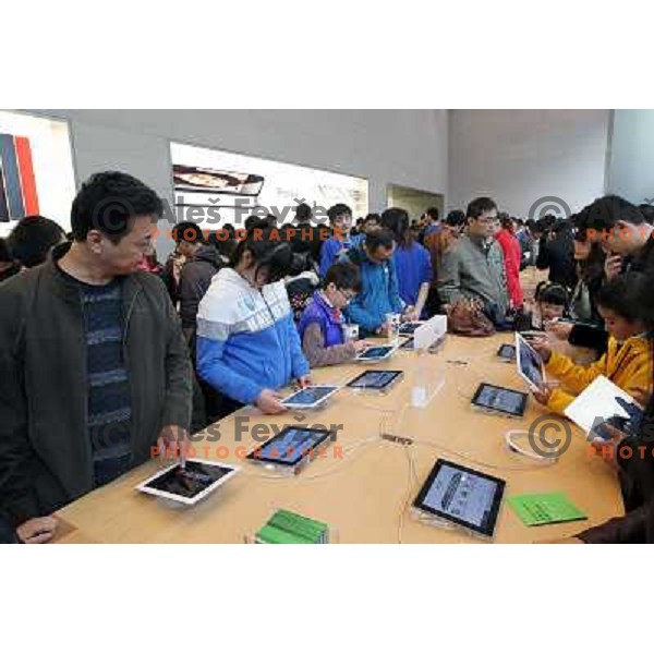 Chinese people in Apple Store in downtown Shangahi. Located in the Yangtze River Delta in eastern China, Shanghai has more than 25 million people. It is a popular tourist destination renowned for its historical landmarks and new urban life. 