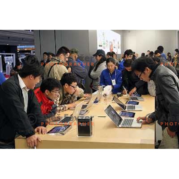 Chinese people in Apple Store in downtown Shangahi. Located in the Yangtze River Delta in eastern China, Shanghai has more than 25 million people. It is a popular tourist destination renowned for its historical landmarks and new urban life. 