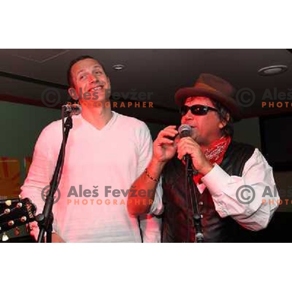 Jure Kosir and Peter Lovsin during rock concert in memoriam of Rok Petrovic in Legends Pub, Kranjska gora, Slovenia on March 9,2012 