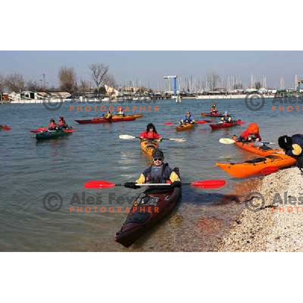 Exploring city of Venice with sea kayaks during 2007 Carnival on Saint Mark Square.