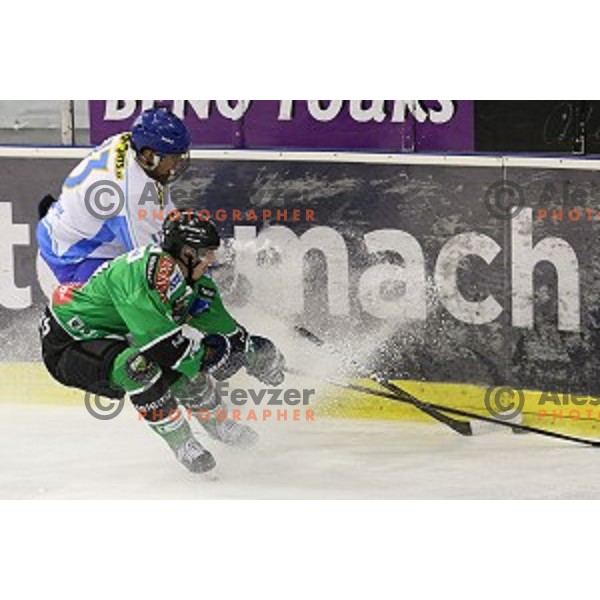 action during ice-hockey match Telemach Olimpija-Triglav in semi-final of DP of Slovenia played in Hala Tivoli, Ljubljana on March 27,2014