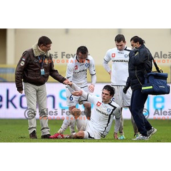 Injured Matic Zitko leaving the pitch during football match Domzale-Celje in round 20 of Prva liga Telekom Slovenije, played in Domzale Sports Park, Slovenia on December 6,2014