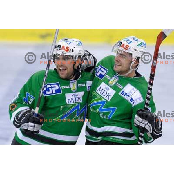 Kevin Mitchel and Jeremiah McCarty celebrate the goal for 1:0 at the first game of EBEL , ZM Olimpija : KAC 