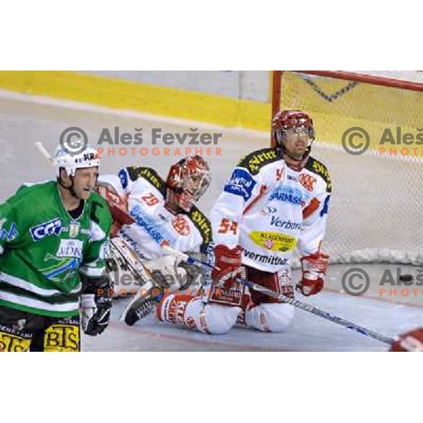 KAZ player Andrew Schneider on his knees after KAZ received a goal at the first game of EBEL , ZM Olimpija : KAC 