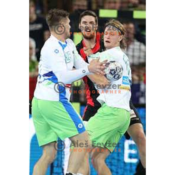 Marko Bezjak and Jure Dolenec in action during Euro 2018 Qualifyers handball match between Slovenia and Germany in SRC Stozice, Ljubljana, Slovenia on May 3,2017