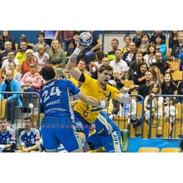 Celje’s Luka Mitrovic (20) in action during EHF Champions League match between Celje PL (Slovenia) and PGE Vive Kielce (Poland) in Zlatorog Hall, Celje on September 30th, 2017