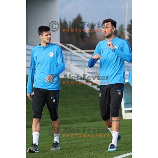 Nemanja Mitrovic and Amir Dervisevic of Slovenia National Football team during practice session in NNC Brdo on November 12, 2018
