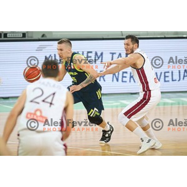 Gregor Hrovat and Janis Blums in action during FIBA Basketball World Cup 2019 European Qualifiers between Slovenia and Latvia in SRC Stozice, Ljubljana, Slovenia on December 2, 2018