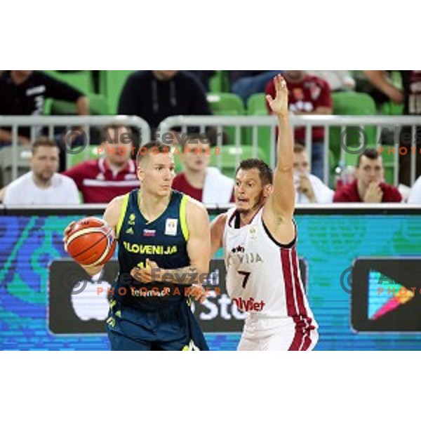 Gregor Hrovat of Slovenia and Janis Blums in action during FIBA Basketball World Cup 2019 European Qualifiers between Slovenia and Latvia in SRC Stozice, Ljubljana, Slovenia on December 2, 2018