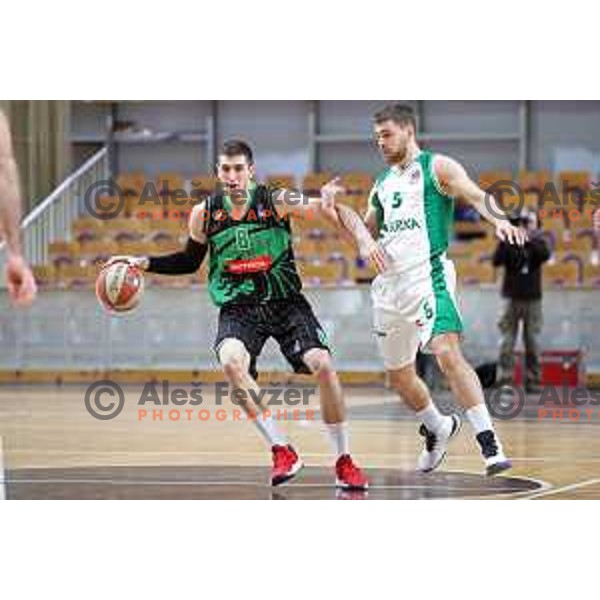 Aleksandar Lazic of Petrol Olimpija and Paolo Marinelli in action during ABA league basketball match between Petrol Olimpija and Krka in Tivoli Hall, Ljubljana on December 16, 2018
