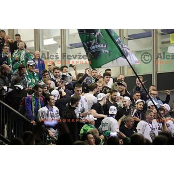 Ales Music, Gal Koren and players of SZ Olimpija celebrate title in Slovenian ice-hockey League after final match between SZ Olimpija and SIJ Acroni Jesenice in Tivoli Hall, Ljubljana, Slovenia on April 25, 2019