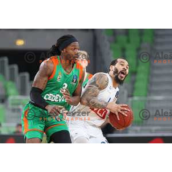Kendrick Perry of Cedevita Olimpija and Justin Cobbs in action during 7days EuroCup basketball match between Cedevita Olimpija (SLO) and Buducnost VOLI (MNE) in SRC Stozice, Ljubljana on January 19, 2021
