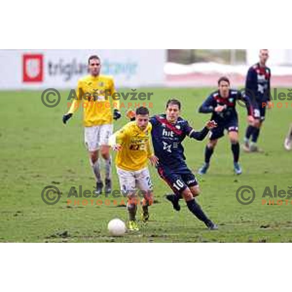 Loren Maruzin and Goran Cvijanovic in action during Prva Liga Telekom Slovenije 2020-2021 football match between Bravo and Gorica in Ljubljana on February 10, 2021