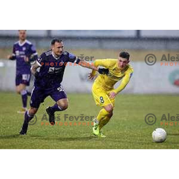 Spiro Pericic and Tamar Svetlin of Domzale in action during Prva Liga Telekom Slovenije 2020-2021 football match between Domzale and Maribor in Domzale, Slovenia on February 10, 2021
