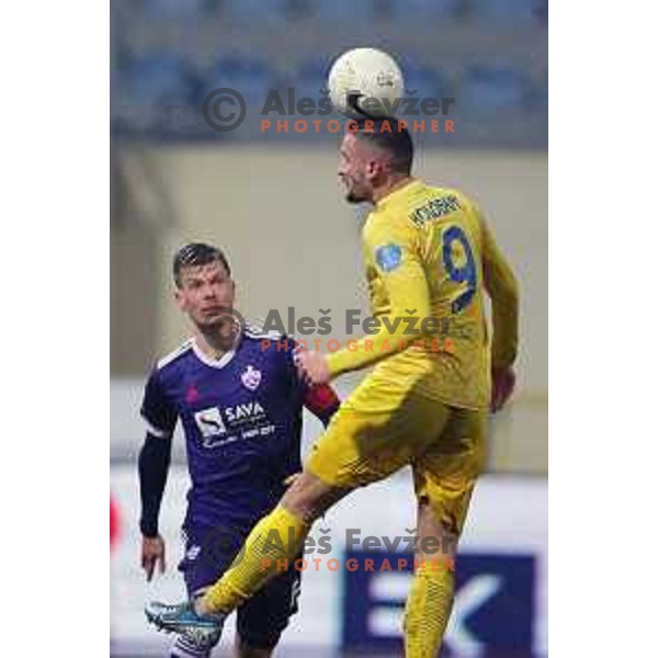 Aleks Pihler and Dario Kolobaric in action during Prva Liga Telekom Slovenije 2020-2021 football match between Domzale and Maribor in Domzale, Slovenia on February 10, 2021