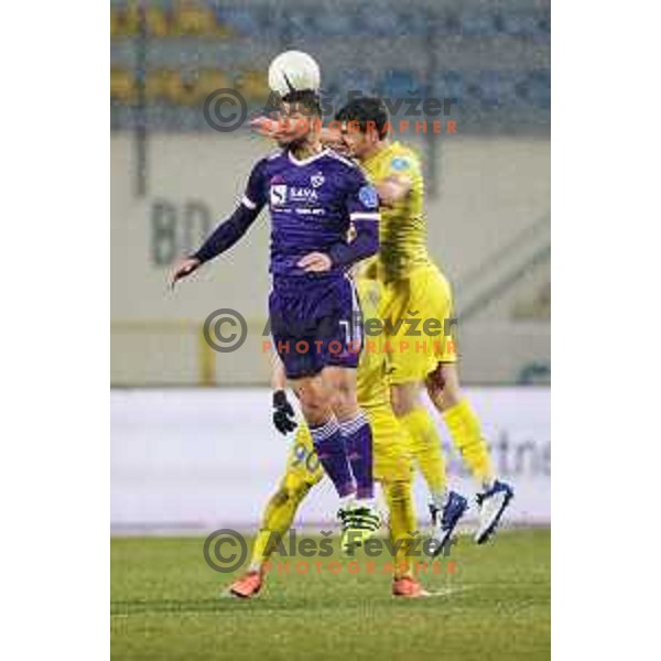 Sven Sostaric Karic and Rok Kronaveter in action during Prva Liga Telekom Slovenije 2020-2021 football match between Domzale and Maribor in Domzale, Slovenia on February 10, 2021