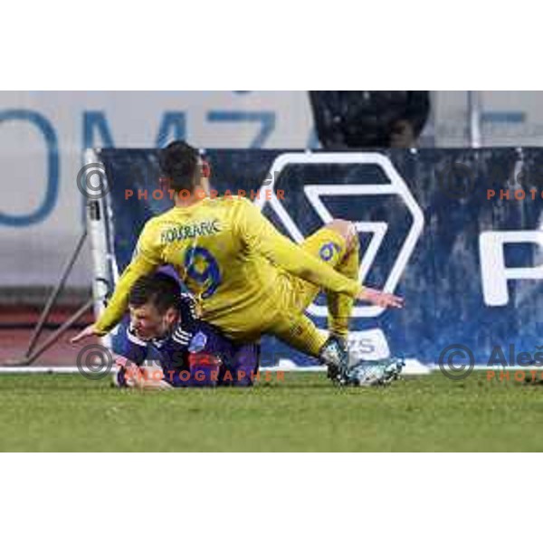 Aleks Pihler and Dario Kolobaric in action during Prva Liga Telekom Slovenije 2020-2021 football match between Domzale and Maribor in Domzale, Slovenia on February 10, 2021