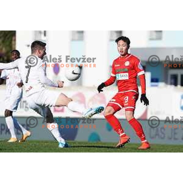 Leon Sever and Dohyun Kim in action during Prva Liga Telekom Slovenije 2020-2021 football match between Tabor and Aluminij in Sezana on February 14, 2021