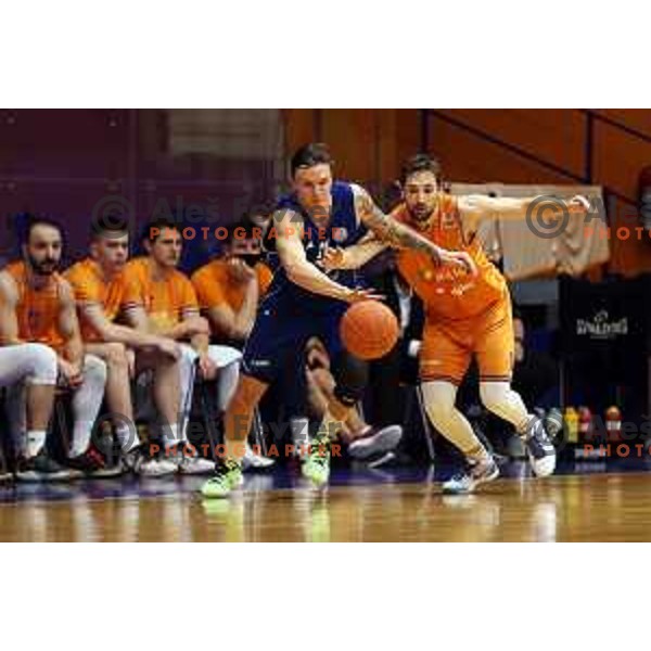 Matic Macek and Tadej Ferme in action during Nova KBM league basketball match between Helios Suns and Terme Olimia Podcetrtek in Domzale on February 26, 2021