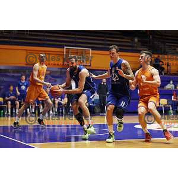 Mihailo Sekulovic and Milojko Vasilic in action during Nova KBM league basketball match between Helios Suns and Terme Olimia Podcetrtek in Domzale on February 26, 2021