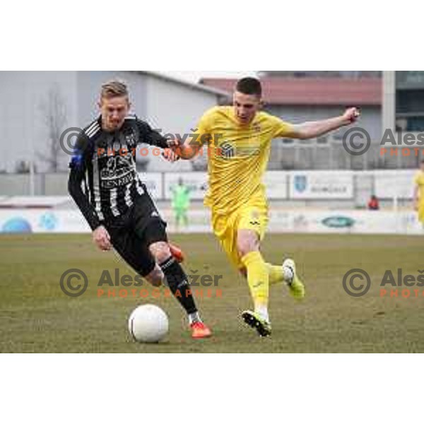 Zan Karnicnik and Tamar Svetlin in action during Prva Liga Telekom Slovenije 2020-2021 football match between Domzale and Mura in Domzale, Slovenia on March 10, 2021