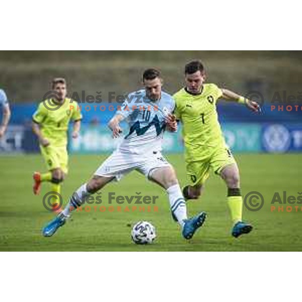 Timi Max Elsnik vs Pavel Bucha in action during U21 UEFA European Championship 2021 football match between Slovenia and Czech Republic in Arena Z’dezele, Celje, Slovenia on March 27, 2021