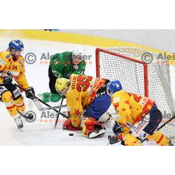 Juuso Pulli and Gianluca Vallini in action during the Final of Alps league ice-hockey match between SZ Olimpija and Asiago in Ljubljana, Slovenia on April 20, 2021