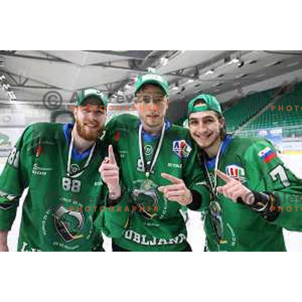 Miha Zajc, Tadej Cimzar and Nejc Brus of SZ Olimpija, Winners of the Final of Alps league ice-hockey match between SZ Olimpija and Asiago in Ljubljana, Slovenia on April 24, 2021