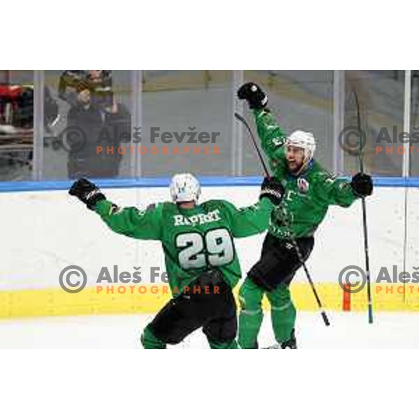 Ziga Pance and Anze Ropret celebrate goal during third match of the Final of Alps league ice-hockey match between SZ Olimpija and Asiago in Ljubljana, Slovenia on April 24, 2021