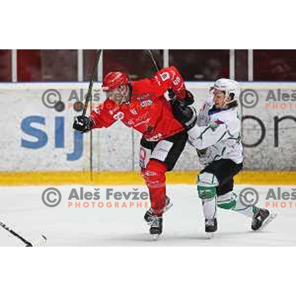 Nejc Stojan and Nejc Brus in action during second game of the Final of Slovenian Championship ice-hockey match between SIJ Acroni Jesenice and SZ Olimpija in Jesenice, Slovenia on May 3, 2021