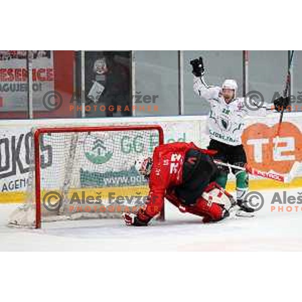 Ales Music scores winning goal past Zan Us during fourth game of the Final of Slovenian Championship ice-hockey match between SIJ Acroni Jesenice and SZ Olimpija in Jesenice, Slovenia on May 7, 2021