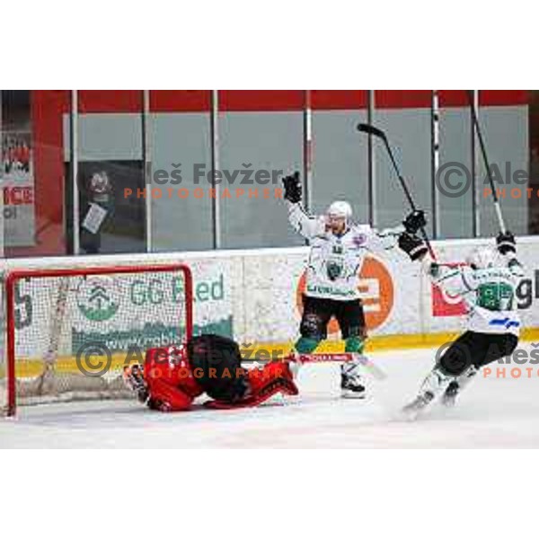 Ales Music and Marc Oliver Vallerand celebrate winning goal during fourth game of the Final of Slovenian Championship ice-hockey match between SIJ Acroni Jesenice and SZ Olimpija in Jesenice, Slovenia on May 7, 2021
