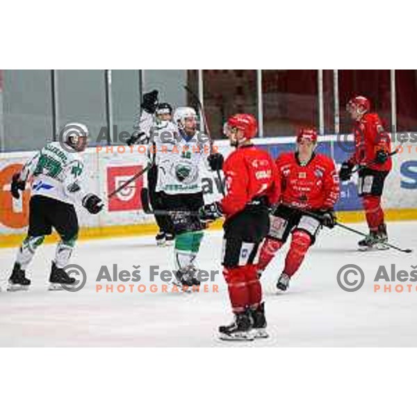 Ales Music and Marc Oliver Vallerand celebrate winning goal during fourth game of the Final of Slovenian Championship ice-hockey match between SIJ Acroni Jesenice and SZ Olimpija in Jesenice, Slovenia on May 7, 2021