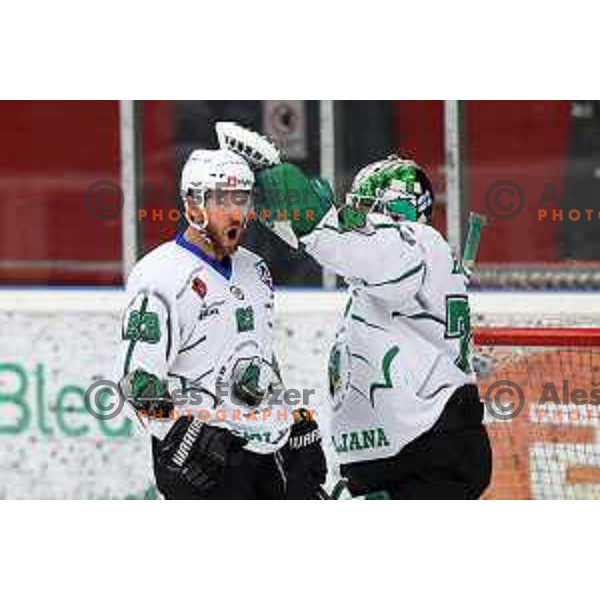 Luka Vidmar and Paavo Holsa at fourth game of the Final of Slovenian Championship ice-hockey match between SIJ Acroni Jesenice and SZ Olimpija in Jesenice, Slovenia on May 7, 2021