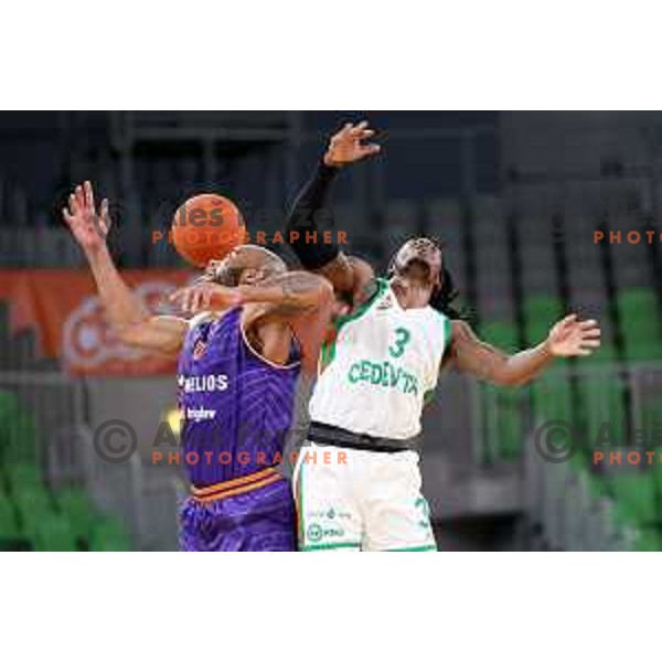 Reginald Keely and Kendrick Perry in action during semi-final of Nova KBM league basketball match between Cedevita Olimpija and Helios Suns in Ljubljana on May 14, 2021