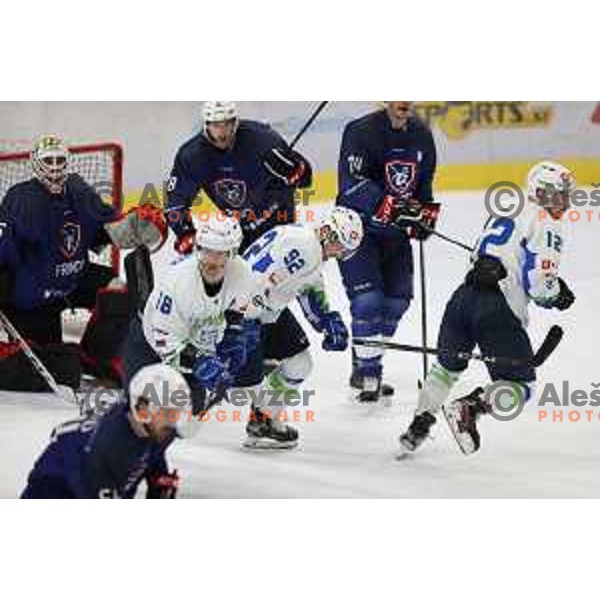 Anze Kuralt, Nik Simsic, Ken Ograjensek in action during Beat Covid-19 ice-hockey tournament match between Slovenia and France in Tivoli Hall, Ljubljana on May 17, 2021