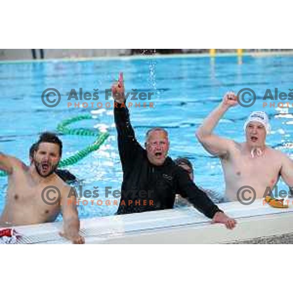 Martin Stele, head coach Ales Komelj and players of Calcit Kamnik celebrate Slovenian National Waterloo Title after victory over Triglav Kranj in the fourth match of the Final in Kamnik, Slovenia on June 2, 2021